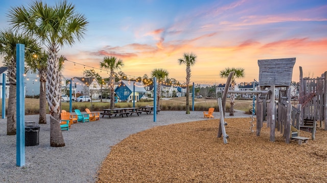 community jungle gym with a residential view