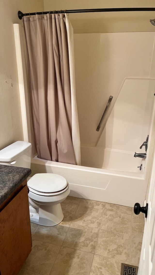 full bath featuring visible vents, toilet, shower / tub combo, vanity, and tile patterned floors