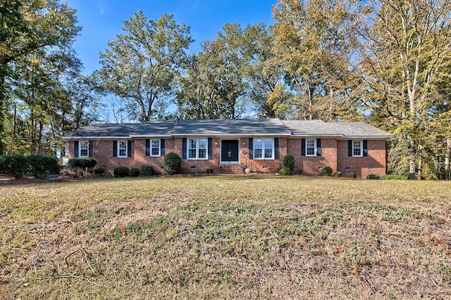 single story home with brick siding, crawl space, and a front yard