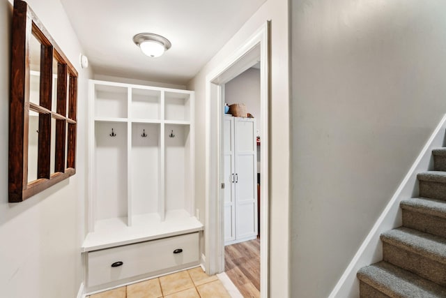 mudroom featuring light tile patterned floors