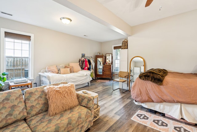 bedroom featuring dark wood-type flooring and ceiling fan