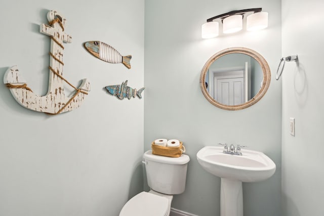 bathroom with sink and toilet