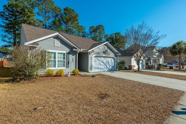 single story home featuring a garage