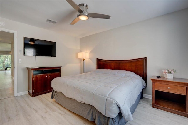 bedroom featuring wood-type flooring and ceiling fan