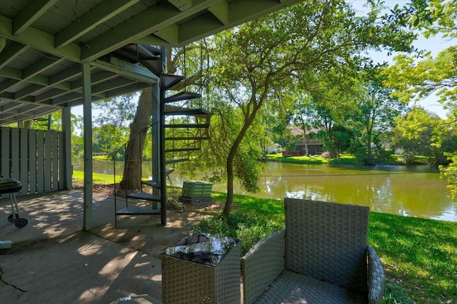 view of patio featuring a water view