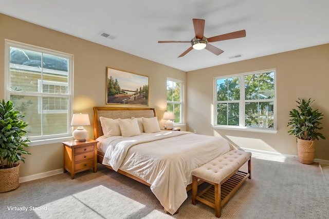 carpeted bedroom featuring ceiling fan