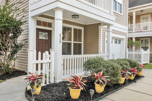 entrance to property featuring a balcony