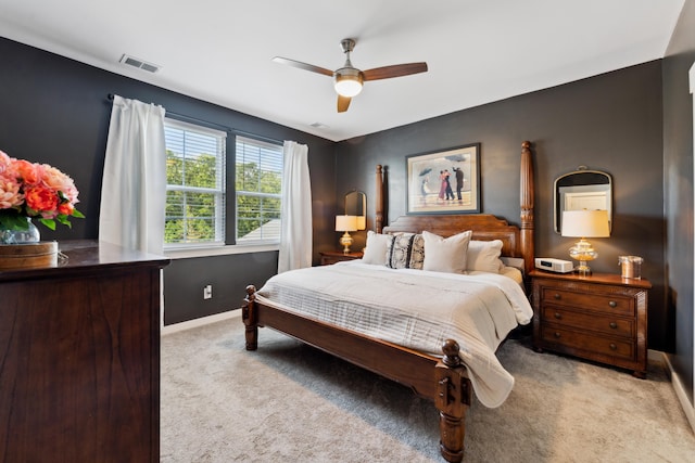 bedroom featuring ceiling fan and light colored carpet