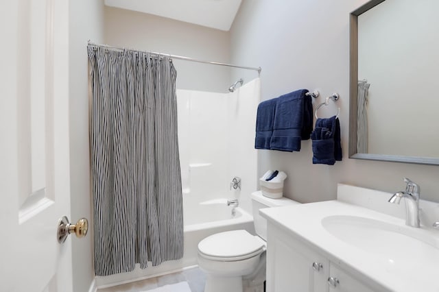 full bathroom featuring vanity, shower / tub combo, and toilet