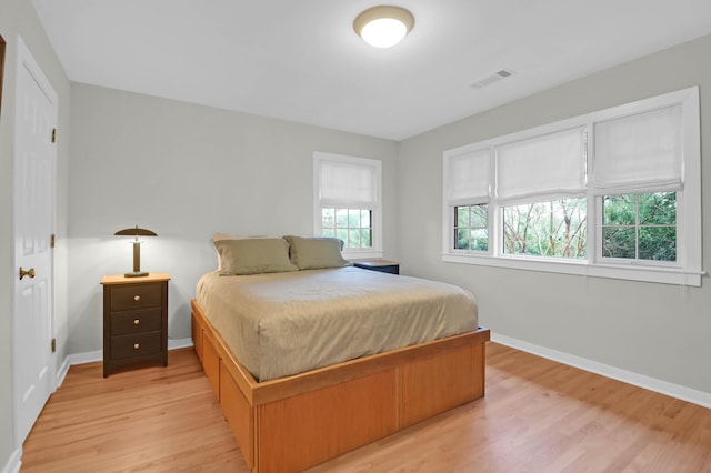 bedroom featuring light hardwood / wood-style floors