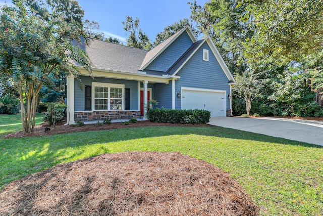 craftsman house with a front yard and covered porch