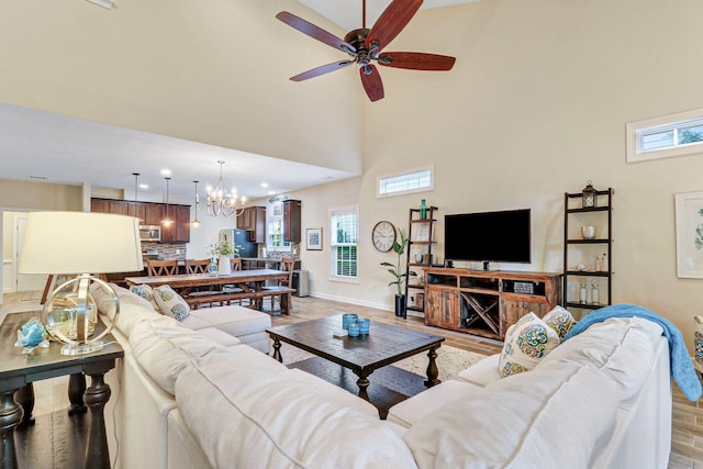 235 Club Gate, Bluffton, SC 29910 - living area with a healthy amount of sunlight, light wood finished floors, and a towering ceiling