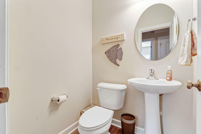 235 Club Gate, Bluffton, SC 29910 - bathroom with toilet, wood finished floors, and baseboards