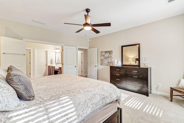 235 Club Gate, Bluffton, SC 29910 - bedroom featuring light carpet, ensuite bathroom, baseboards, visible vents, and a ceiling fan