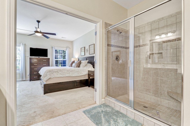 235 Club Gate, Bluffton, SC 29910 - ensuite bathroom with tile patterned floors, a stall shower, ceiling fan, and connected bathroom