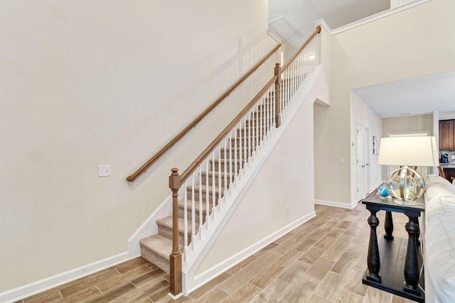 staircase featuring hardwood / wood-style floors