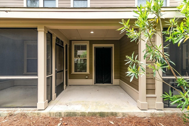 doorway to property featuring a patio