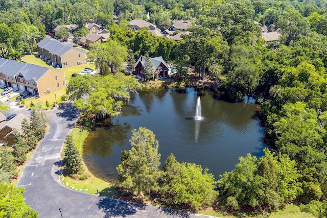 birds eye view of property featuring a water view and a residential view
