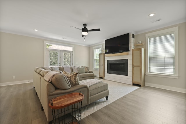 3705 Sandy Gate Ln, Mount Pleasant, SC 29466 - living room with a ceiling fan, wood finished floors, a large fireplace, and recessed lighting