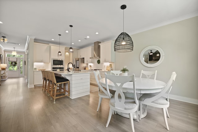 3705 Sandy Gate Ln, Mount Pleasant, SC 29466 - dining space with crown molding, recessed lighting, and light wood-type flooring