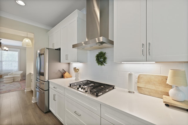 3705 Sandy Gate Ln, Mount Pleasant, SC 29466 - kitchen featuring wall chimney range hood, stainless steel appliances, white cabinets, dark wood-type flooring, and light countertops