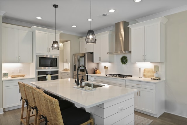 3705 Sandy Gate Ln, Mount Pleasant, SC 29466 - kitchen featuring wall chimney range hood, appliances with stainless steel finishes, backsplash, white cabinetry, and recessed lighting