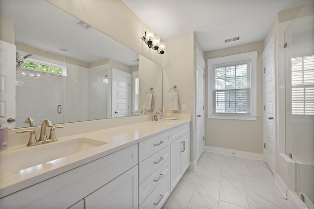 3705 Sandy Gate Ln, Mount Pleasant, SC 29466 - bathroom featuring plenty of natural light, marble finish floors, double vanity, and a stall shower