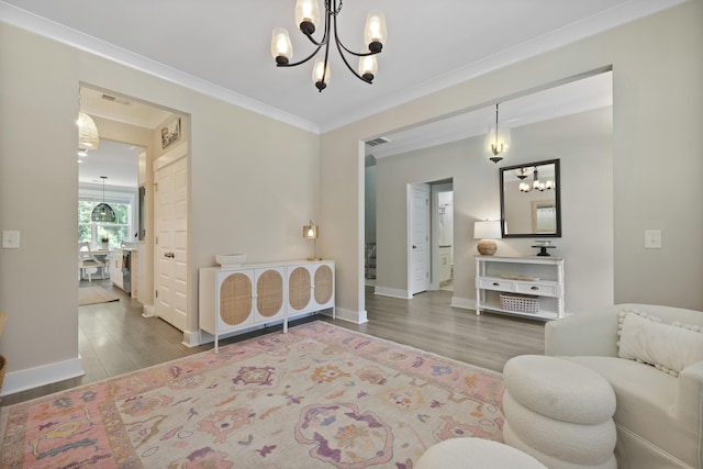 3705 Sandy Gate Ln, Mount Pleasant, SC 29466 - living room with a chandelier, wood finished floors, and crown molding