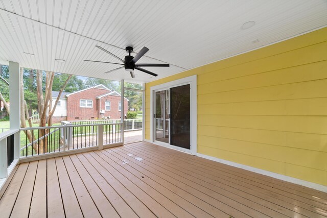 wooden deck with ceiling fan