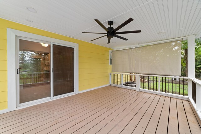 wooden deck with ceiling fan