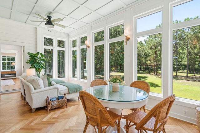 sunroom featuring ceiling fan and coffered ceiling