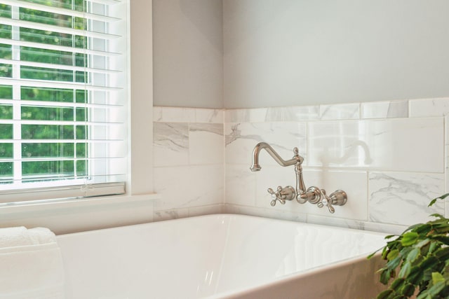 bathroom featuring a bath