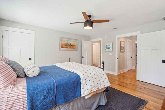 bedroom featuring ceiling fan and light wood-type flooring