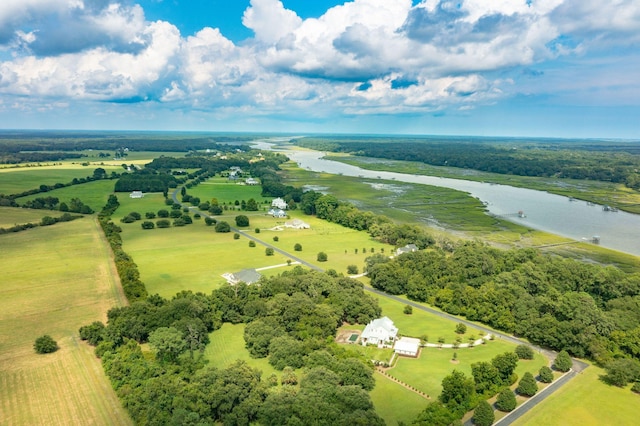 birds eye view of property featuring a rural view and a water view