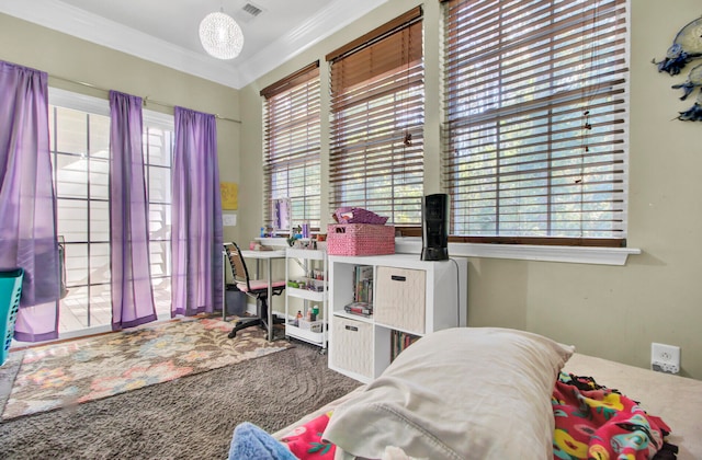 bedroom featuring multiple windows, carpet floors, and ornamental molding