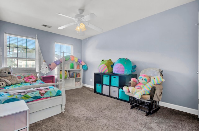 carpeted bedroom with ceiling fan