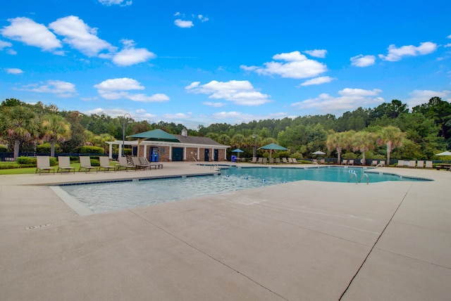 view of swimming pool featuring a patio