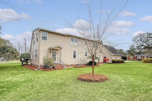 view of front facade featuring a front yard