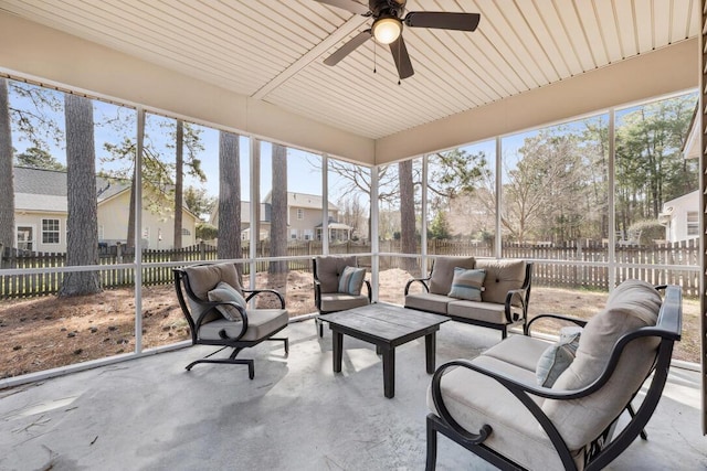 sunroom / solarium featuring an outdoor hangout area and ceiling fan