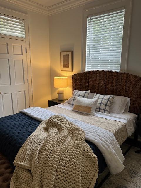 84 Bull St Unit F, Charleston, SC 29401 - bedroom featuring crown molding