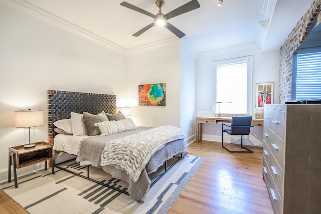 84 Bull St Unit F, Charleston, SC 29401 - bedroom featuring light wood-type flooring, crown molding, baseboards, and ceiling fan