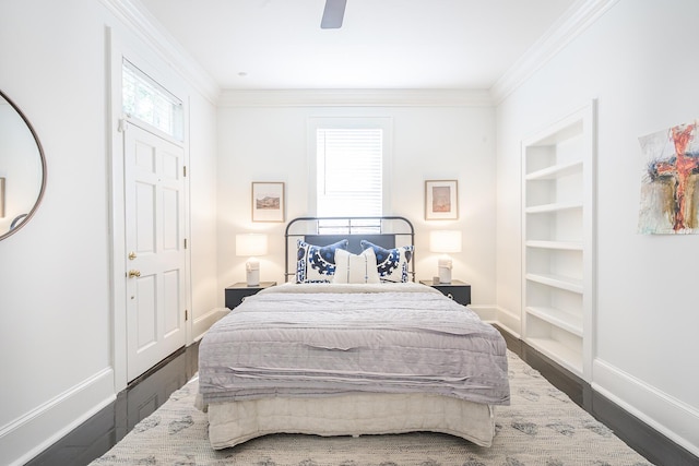 84 Bull St Unit F, Charleston, SC 29401 - bedroom featuring baseboards, ornamental molding, wood finished floors, and ceiling fan