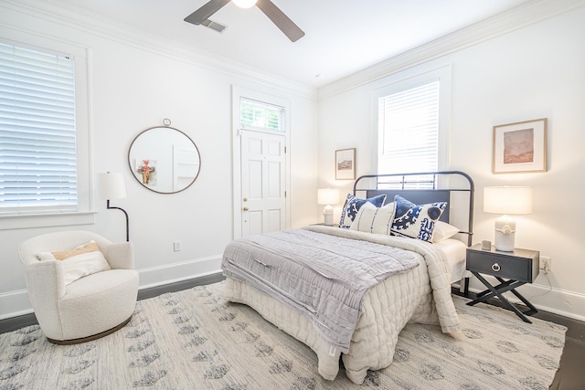 84 Bull St Unit F, Charleston, SC 29401 - bedroom featuring baseboards, wood finished floors, ornamental molding, and a ceiling fan