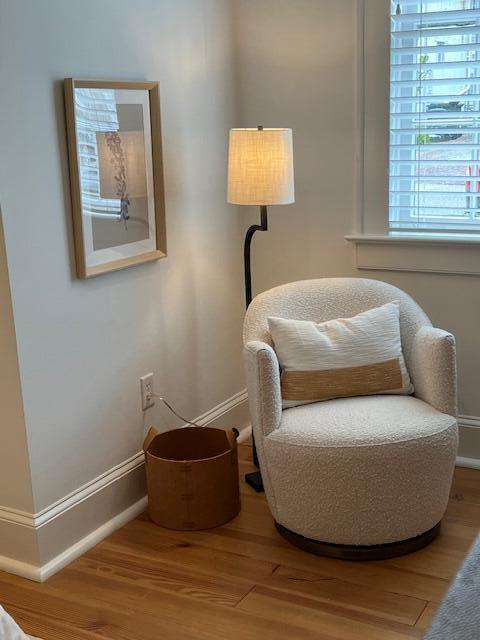 84 Bull St Unit F, Charleston, SC 29401 - living area featuring wood finished floors and baseboards