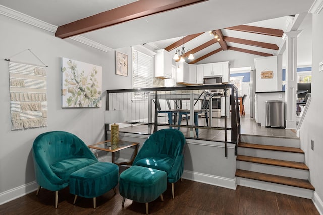 sitting room featuring vaulted ceiling with beams, a healthy amount of sunlight, crown molding, and dark wood-type flooring