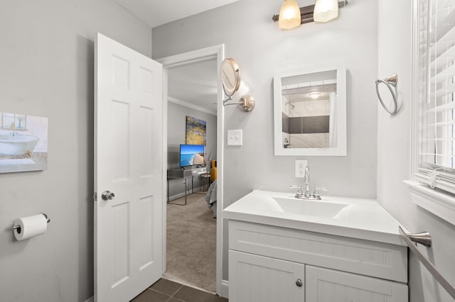 bathroom with vanity, tile patterned floors, and ornamental molding