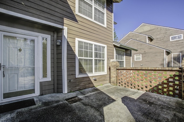 property entrance with a patio area