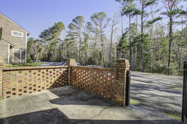 view of patio / terrace with a gate