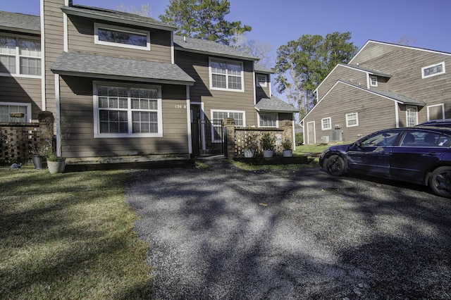 view of front facade featuring a shingled roof