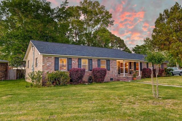 2506 Birkenhead Dr, Charleston, SC 29414 - single story home featuring brick siding, fence, roof with shingles, and a front yard